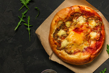 pizza, mushrooms, chicken, tomato sauce, cheese, (pizza ingredients and microgreen). hot pizza. Top view. copy space