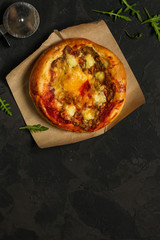 pizza, mushrooms, chicken, tomato sauce, cheese, (pizza ingredients and microgreen). hot pizza. Top view. copy space