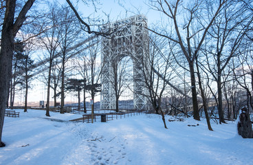Abstract industrial bridge in winter season. Steel George Washington Bridge   over Hudson River. Snow covered ground and bridge. Isolated architectural bridge. - 255775209
