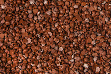 chocolate drops (sweets). food background. copy space. top