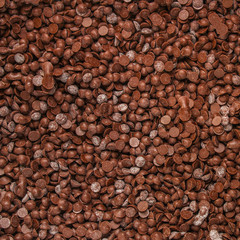 chocolate drops (sweets). food background. copy space. top
