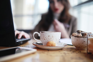 Girl eating coffee cakes