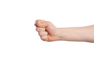 A fist with a thumb between the index and middle fingers is a rude gesture. Fig on an isolated background.