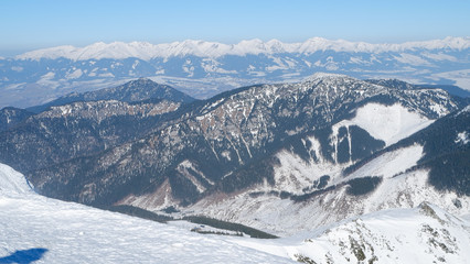 Fototapeta na wymiar Sunny winter mountain landscape, ski resort Yasna, Tatras, Slovakia.