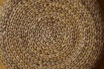 Tabouret from above made of dry straws using circular patterns