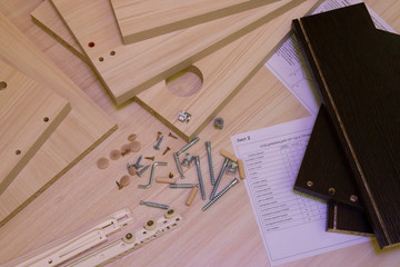 Fototapeta premium Furniture panels made of laminated chipboard and accessories for the assembly of interior items