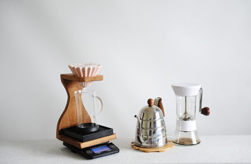 Alternative manual coffee brewing. Pink ceramic origami dripper. Wooden stand. Gringer, gooseneck...