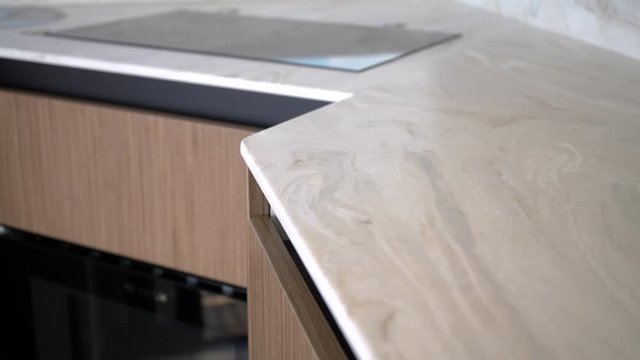 Detail of the marble counter top in the kitchen of a yacht.