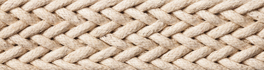 Horizontal linen rope yarn stripe texture. Long string strap pattern.