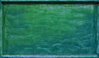 Light green mixed with dark green board has four green steel frames.