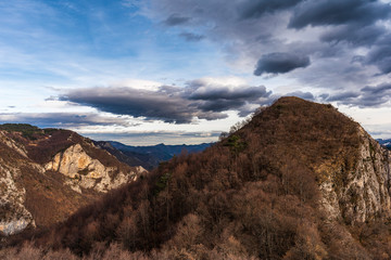 Dramatic clouds in Rhodope mountain, Bulgaria. Last days of winter landscape