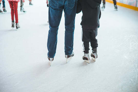 LVIV, UKRAINE - February 3, 2019: people skating on ski rink in city mall