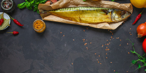 mackerel smoked fish and other ingredients. food background. copy space
