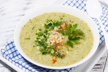 cold green gazpacho in a bowl