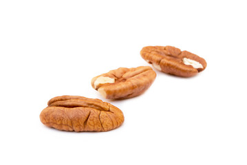 Fresh pecan nuts isolated on a white background