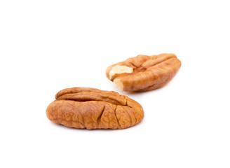 Fresh pecan nuts isolated on a white background