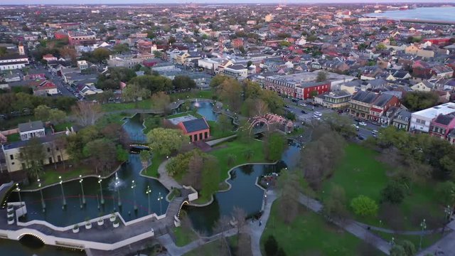 Aerial Fly Over starting at Armstrong Park through the French Quarter New Orleans at Sunset