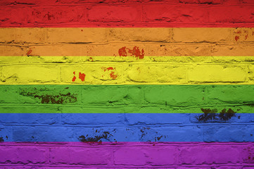 LGBT flag on brick wall background. Background wallpaper for installation and design. Space for text.
