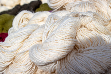 White wool thread.