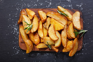 baked potato with rosemary, top view