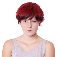 displeased young woman is making a face - obrazy, fototapety, plakaty