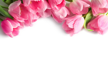 Fototapeta na wymiar Beautiful spring tulips on white background. International Women's Day