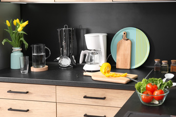 Stylish kitchen counter with houseware and products