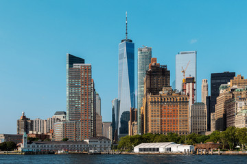 Fototapeta premium New York City / USA - AUG 22 2018: Lower Manhattan skyscrapers and buildings view from the Statue of Liberty
