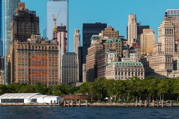 New York City / USA - AUG 22 2018: Lower Manhattan skyscrapers and buildings view from the Statue of Liberty
