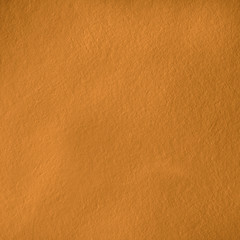 Texture natural stone golden color. Background natural relief stone. Square size.