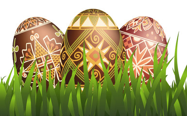 Pysanky easter eggs in grass isolated on white. Traditional ukrainian easter eggs.