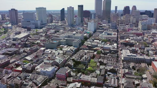 Aerial Zoom Up from the French Quarter towards Downtown New Orleans