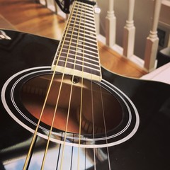 Obraz premium close up of an acoustic guitar