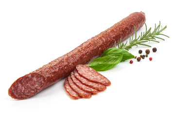 Salami Sausage Stick with herbs, close-up, isolated on white background