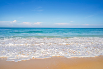 Beach sand and blue sea in blue sky