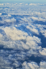 Naklejka premium White clouds from airplane at the morning