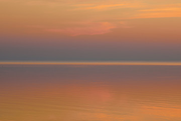 Beautiful clear background sunset color over the lake
