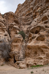 Stairs in red stone in Little Petra in Jordan © Vesna