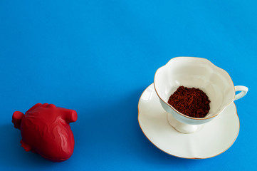 artificial heart and a Cup of coffee