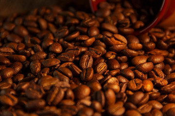Fragrant roasted coffee beans brown and cup