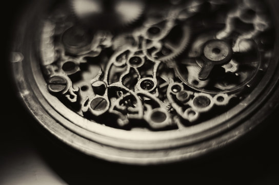 Skeleton watch. skeletonization vintage antique pocket watches. stylized skull on the clockwork. mechanical watch, in which all of the moving parts are visible through, jewelry work.