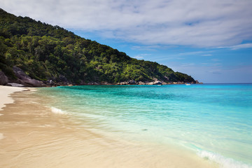 Deserted tropical beach. Travel and vacation concept. Clear sea in thailand