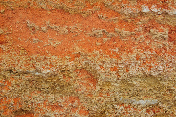  Rock, layeres structure, warm brown, yellow, red shades.