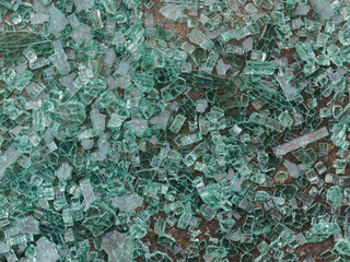 Broken glass shards of car headlamp