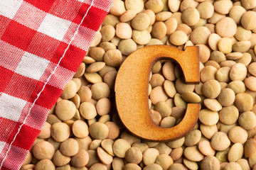 Letter C, Lentils with checkered napkin - Top view