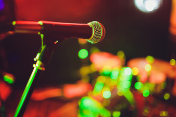 microphone against blur on beverage in pub and restaurant background.