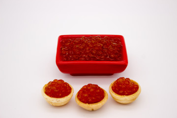 Luxury Red Caviar in the bowl. Food photo concept.