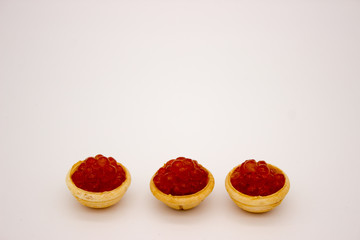 Luxury Red Caviar in the bowl. Food photo concept.