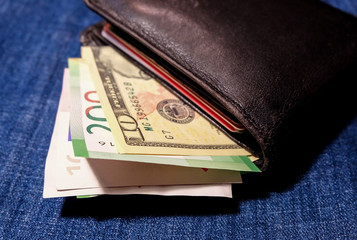 Money in a leather wallet