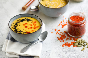 Lentils soup with paprika, pumpkin seeds and sesame. Healthy vegetarian dinner